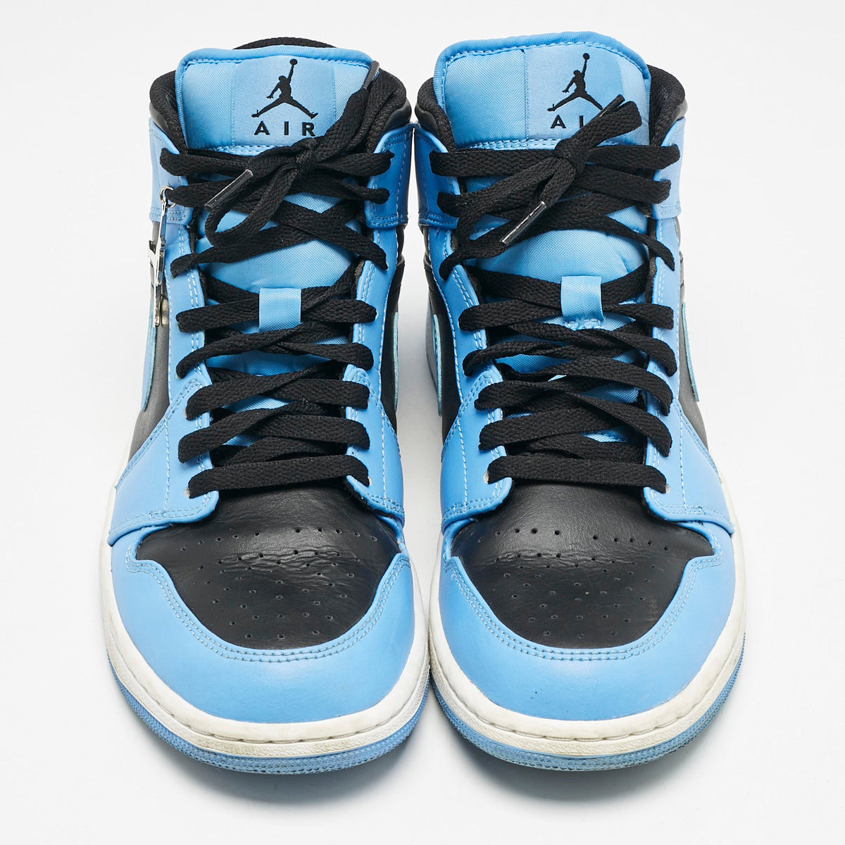 Air Jordans Blue/black Leather Jordan 1 Mid University Blue Black Sneakers