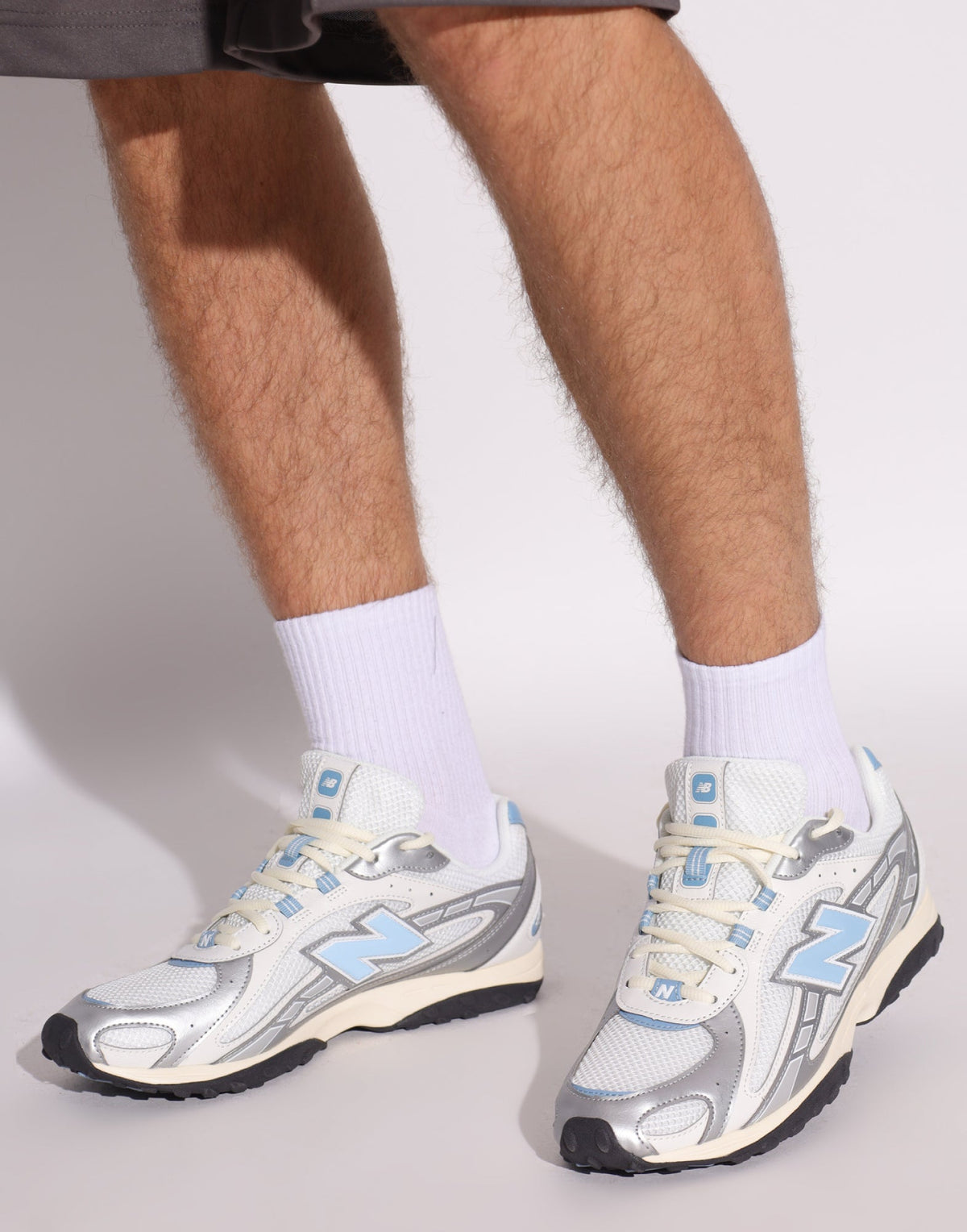 204L Silver Metallic Sky Sneakers