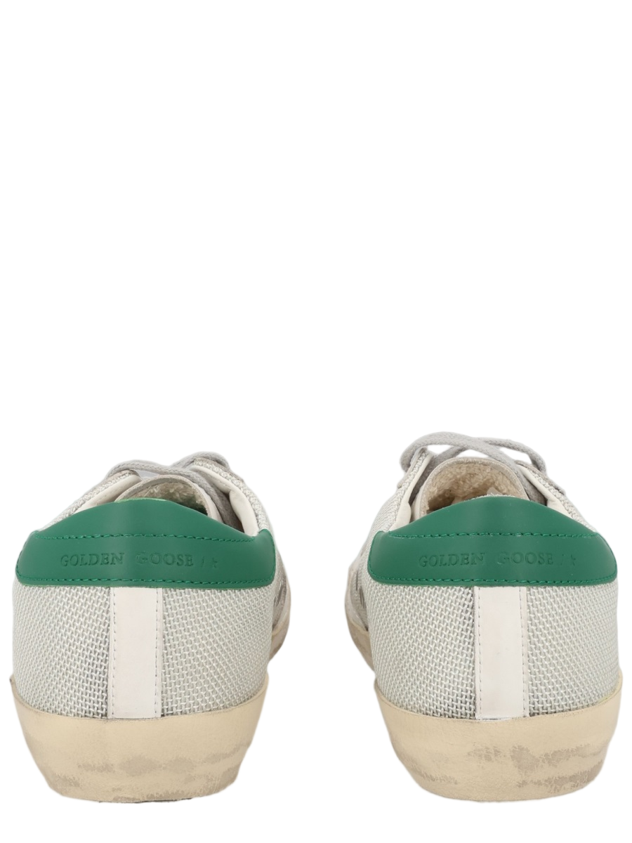 Low-Top Sneakers with Vintage Appeal and Distressed Finish