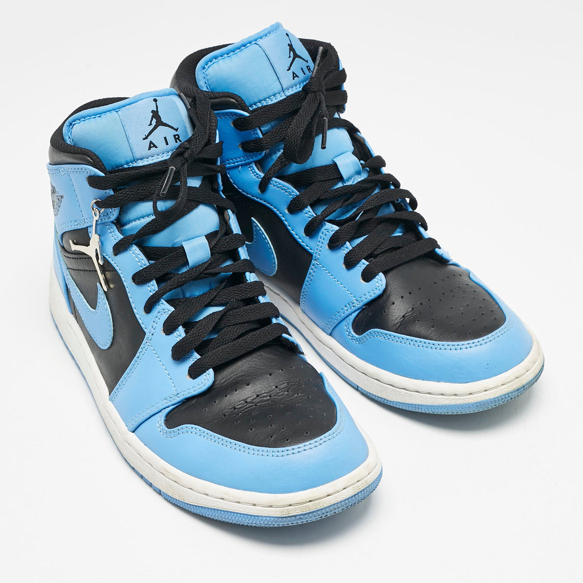 Air Jordans Blue/black Leather Jordan 1 Mid University Blue Black Sneakers