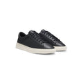 Low-top trainers with woven and grained effects