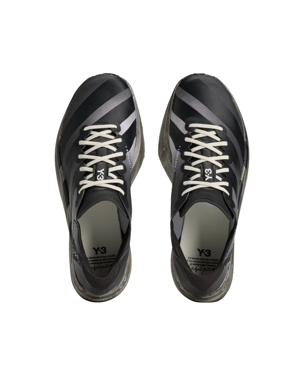 Aerodynamic Black Sneakers with Lightweight Structure and Innovative Midsole