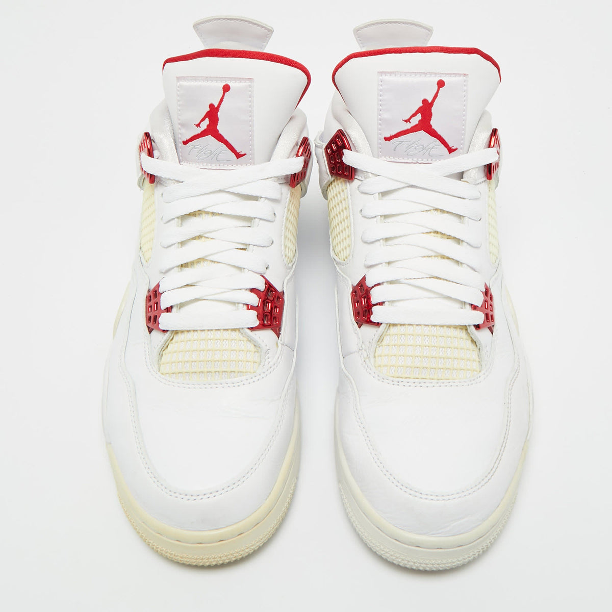 Air Jordans White Leather Jordan 4 Retro Metallic Red Sneakers