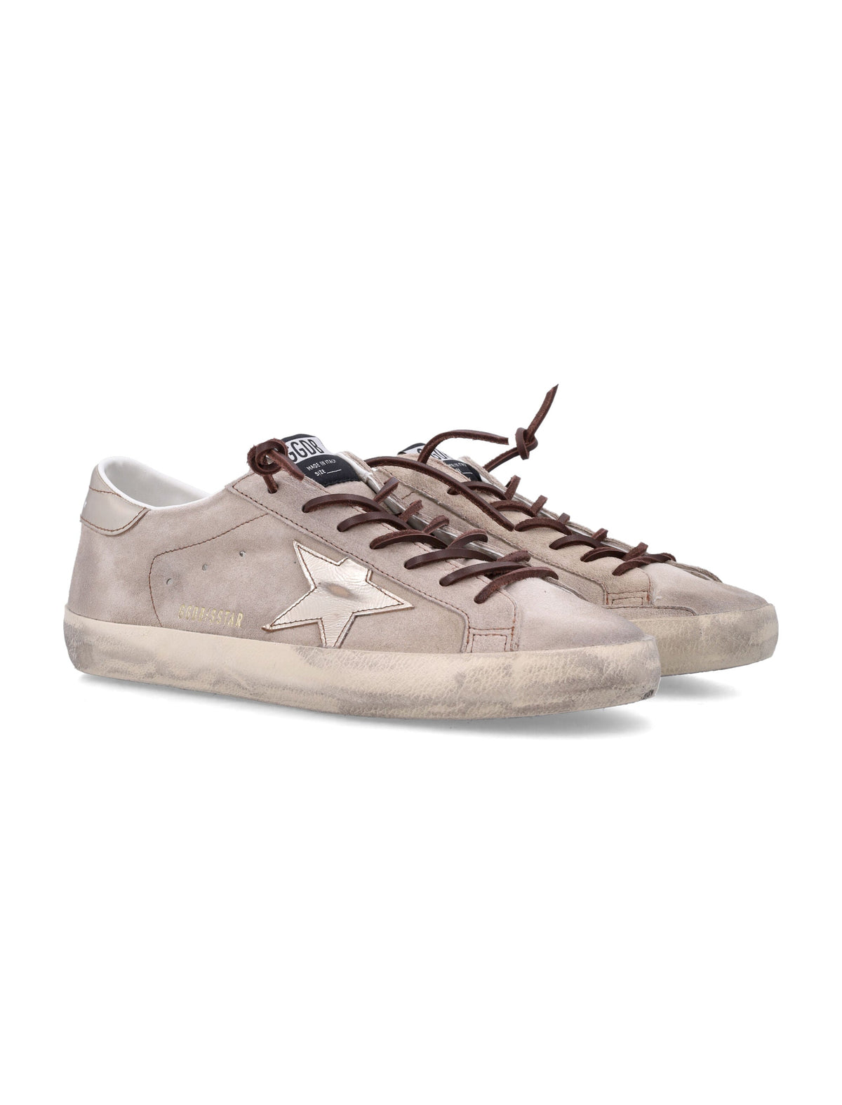 Distressed Beige Suede Sneakers with Metallic Silver Star Detail