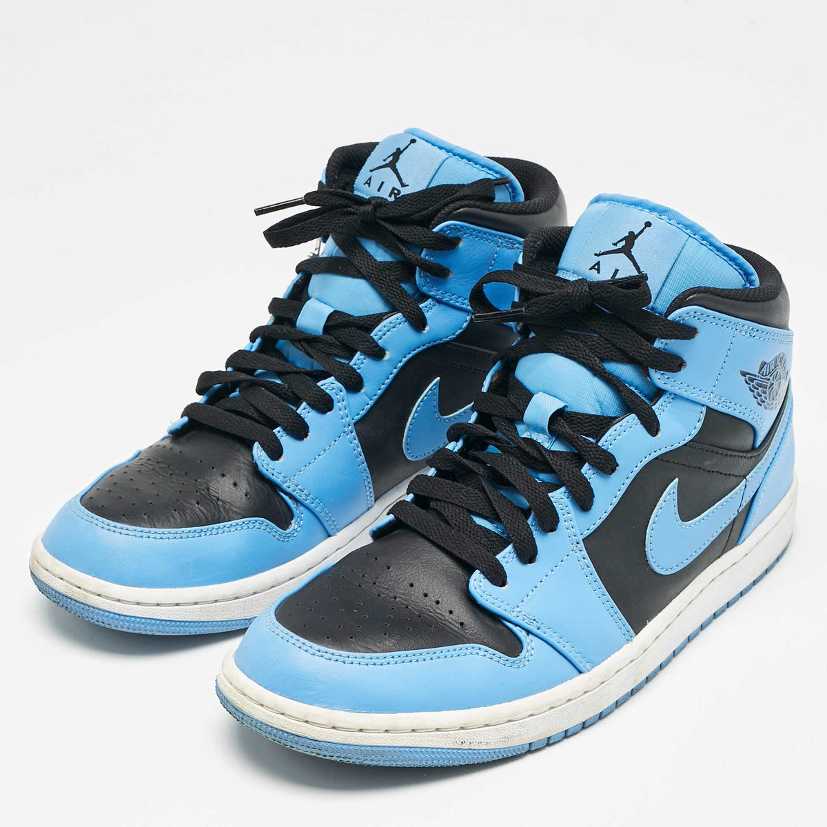 Air Jordans Blue/black Leather Jordan 1 Mid University Blue Black Sneakers